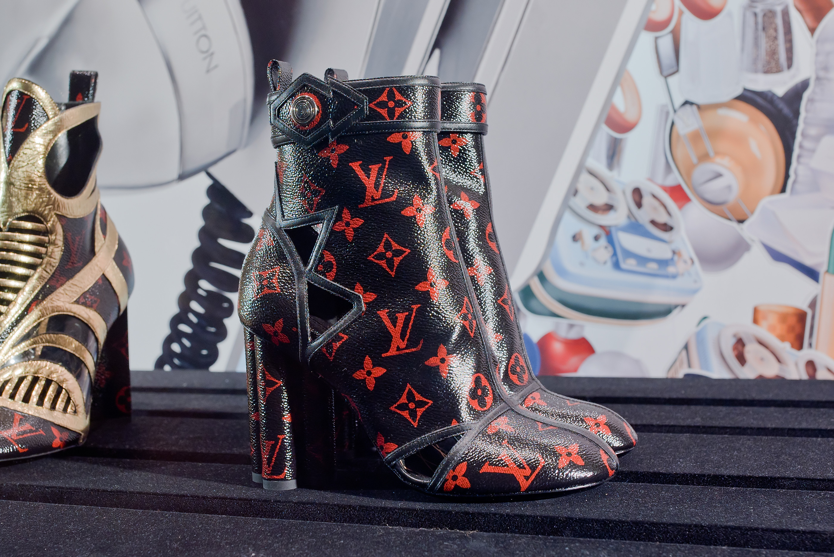 Louis Vuitton boots in red and black patent Monogram canvas | Boy Meets